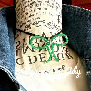 Babydoll choker necklace/untreated emerald bow silhouette pendant suede beaded